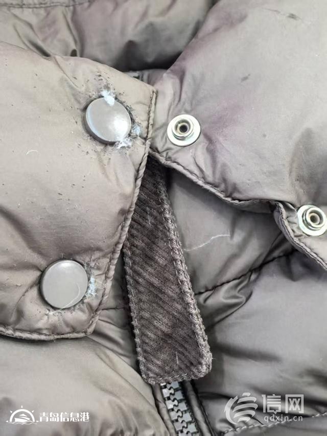 顾客称价值近900元羽绒服被洗破 向彬丽洗衣索赔400元遭拒