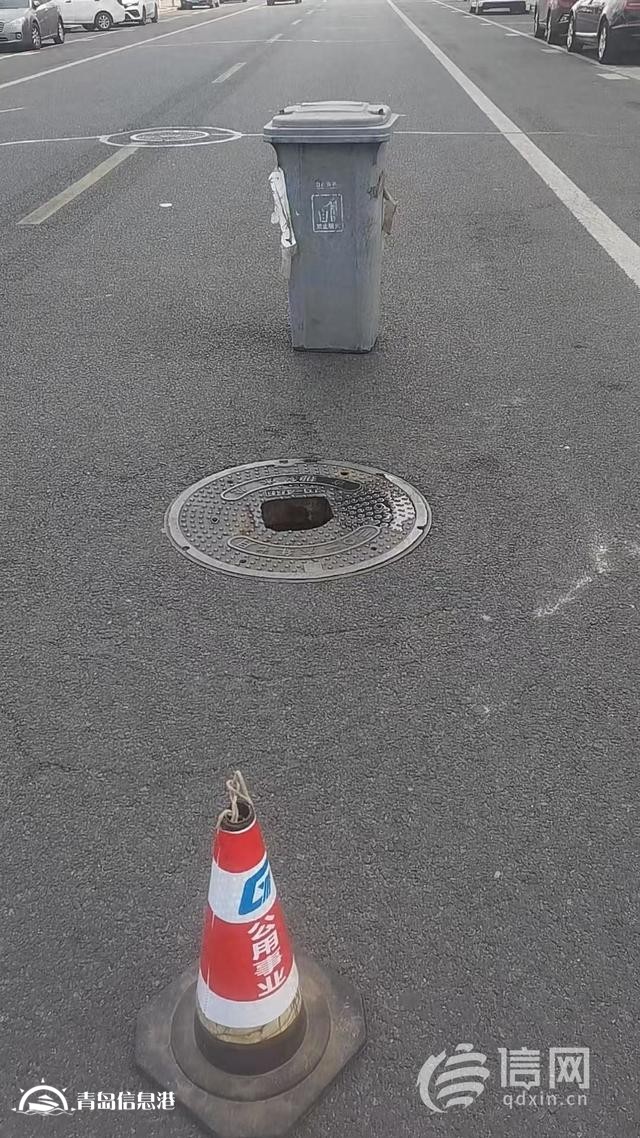 马路中间的井盖损坏 有关部门正加紧派人处理